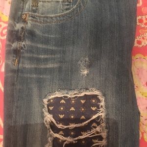 Ripped Miss Me jean